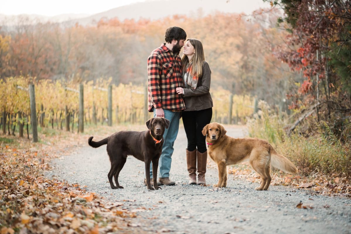 Couple engagement photo idea for fall with pets in Virginia.