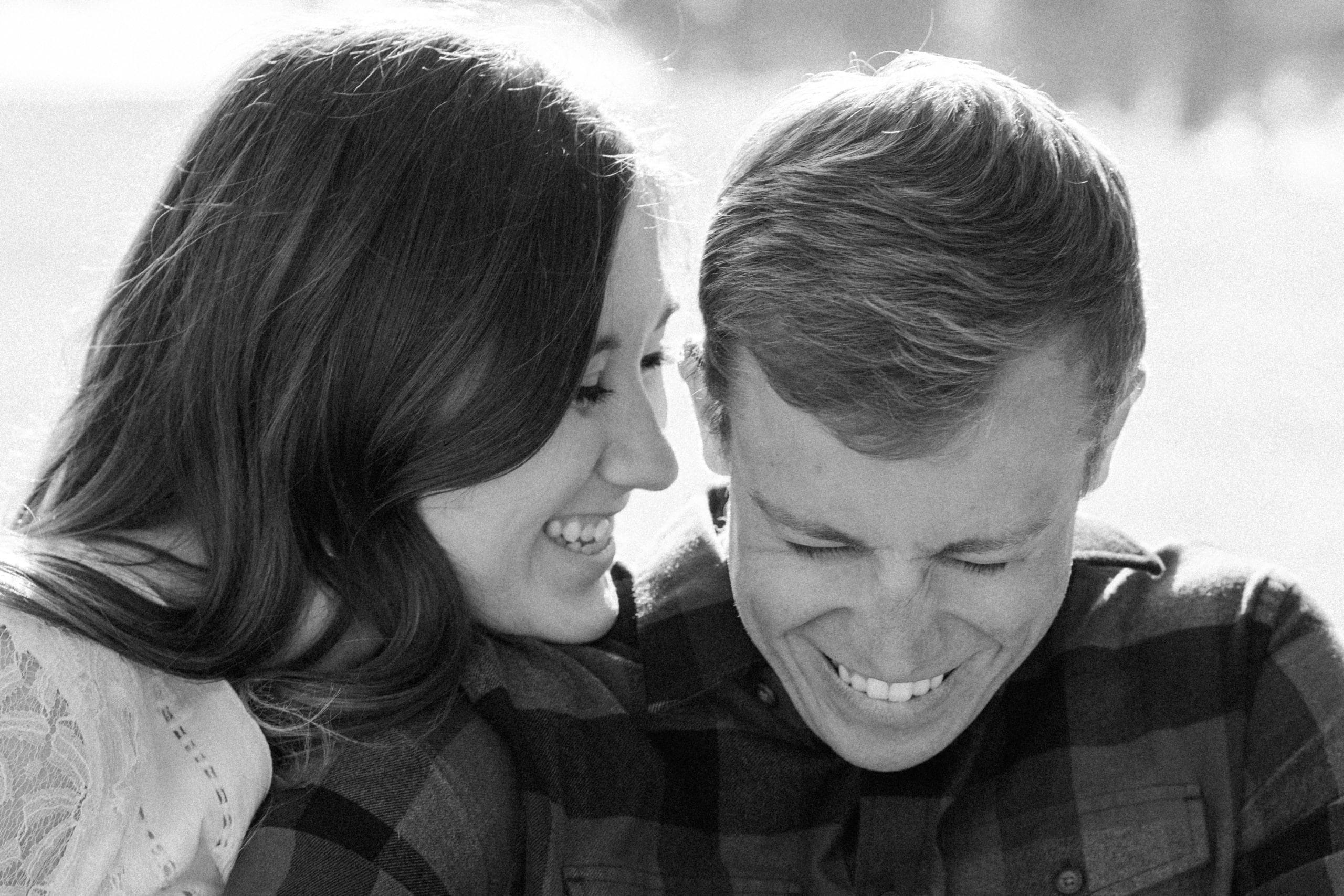 Adorable photo of couple taking engagement photos in Virginia.