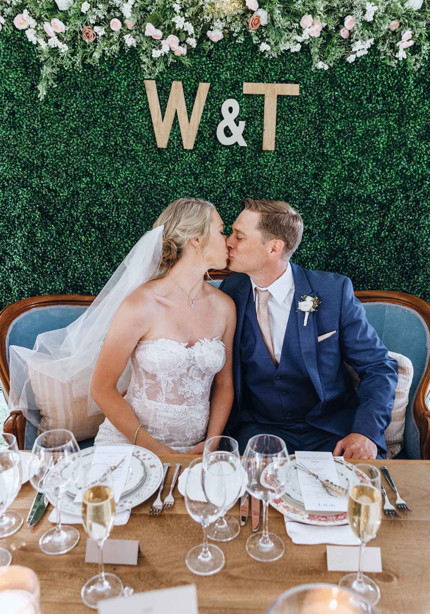 Wes Tessa Lovingston Winery wedding bride and groom kiss