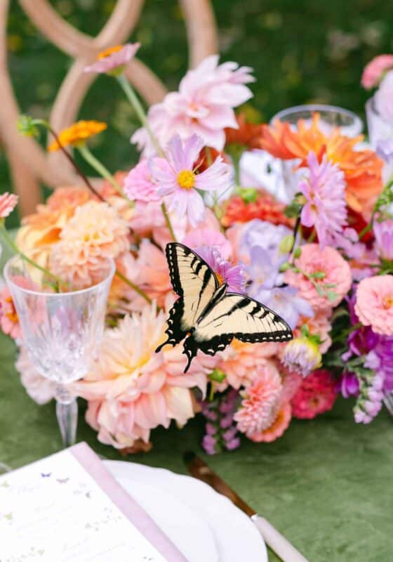colorful fall floral tablescape with butterfly