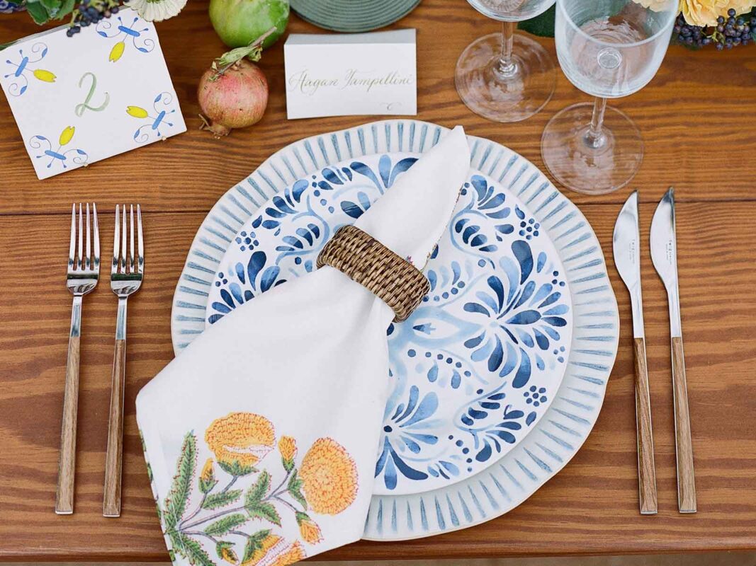 Italian linens and dishes at wedding place setting