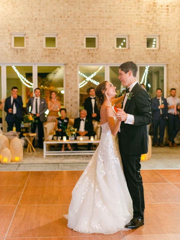 bride and groom dance at art museum wedding