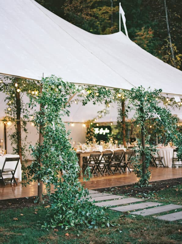 Beautiful wedding tent draped in greenery at Eastwood Farm & Winery, Charlottesville