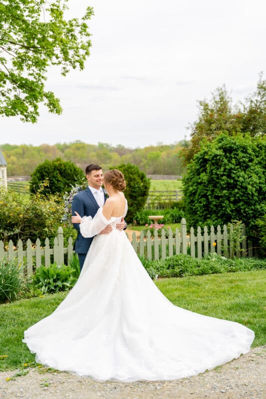 Sylvanside Farm wedding with garden backdrop, full train on gown