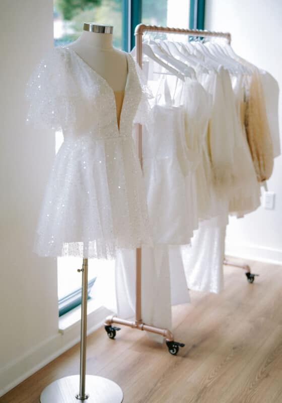 Short bride gowns on rack at Annalise Bridal in Virginia