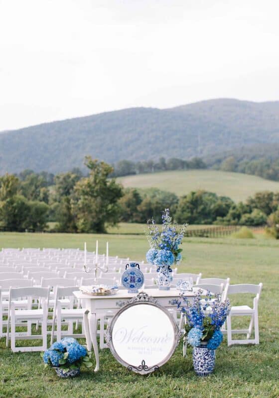 Antique furniture and chinoiserie complemented the blue and white floral arrangements at this wedding.