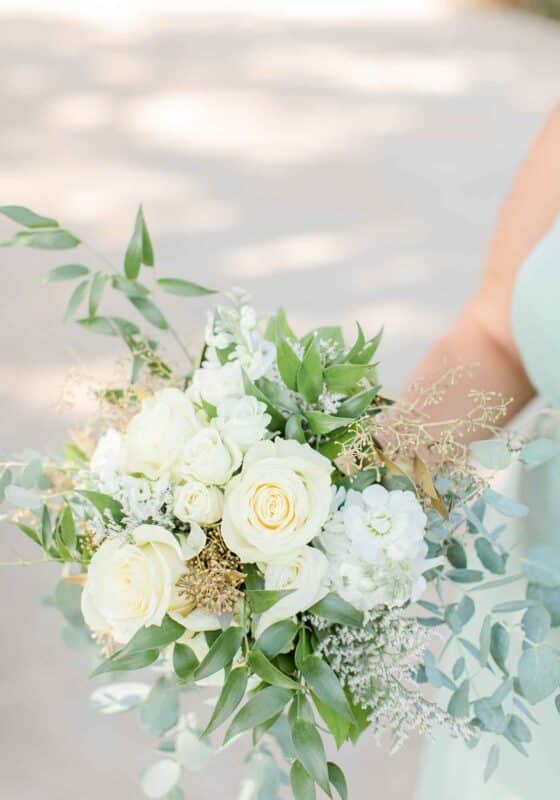 white wedding bouquet with loose greenery