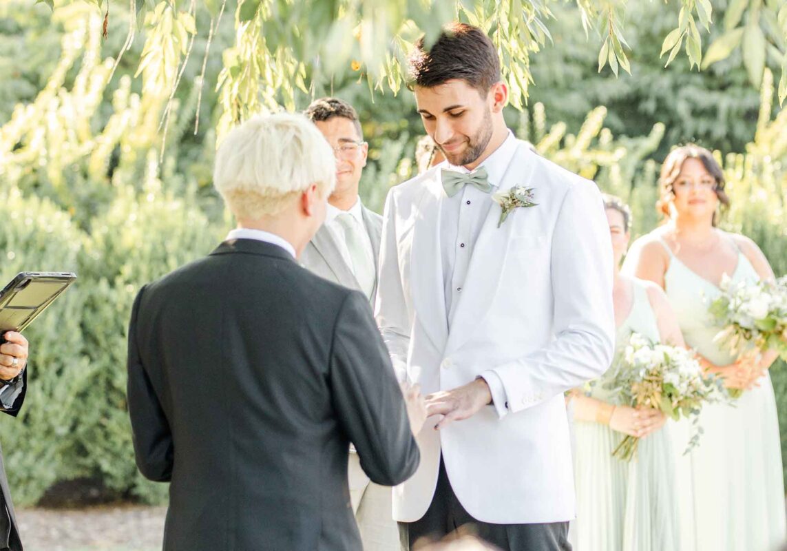 men exchanging wedding vows